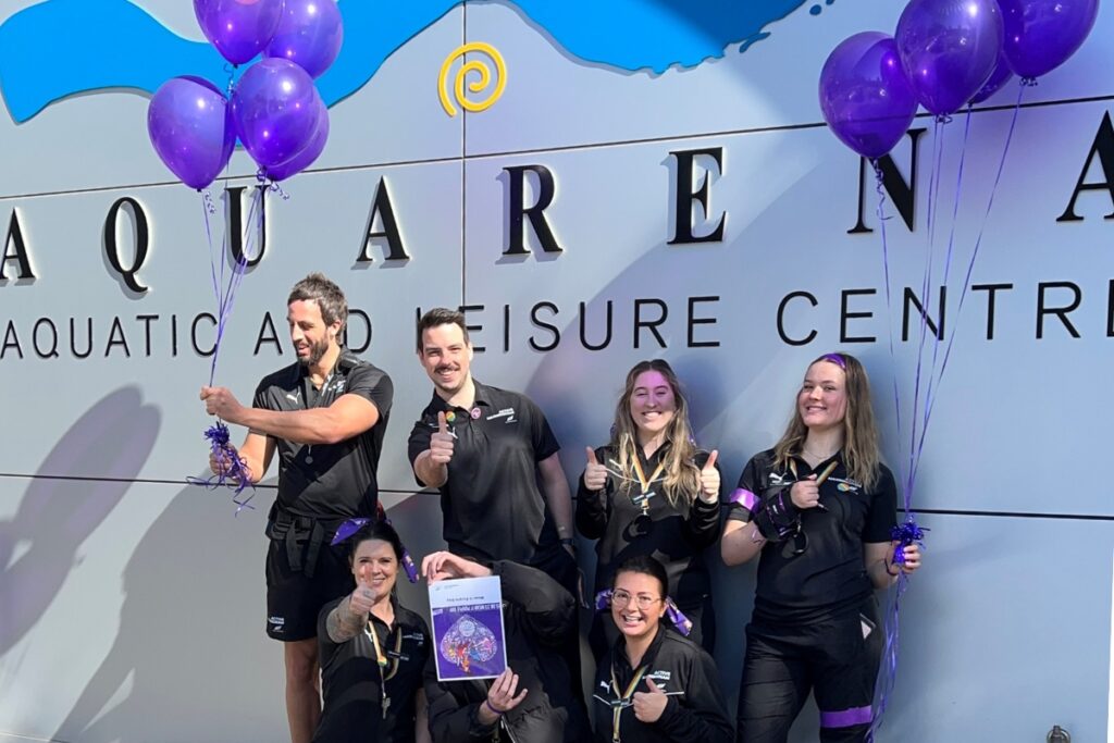 staff of aquarena celebrating Wear it Purple Day